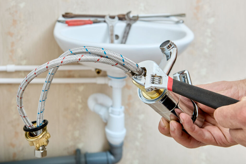 Plumbing fixture installation and repair including faucets, sinks, and garbage disposals