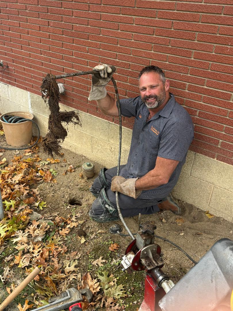 Custom Fit Plumbing team member at work in Eaton, Ohio